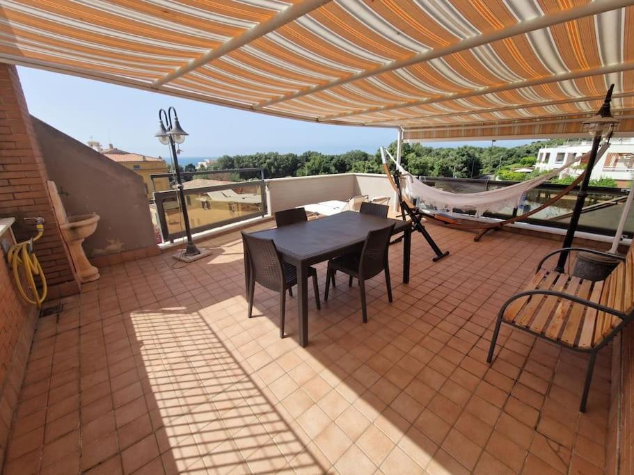 Terrazza A Nettuno E Chiesa Giubilare Santa Maria Goretti Buitenkant foto